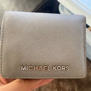 Michael kors wallet Gently used grey wallet .